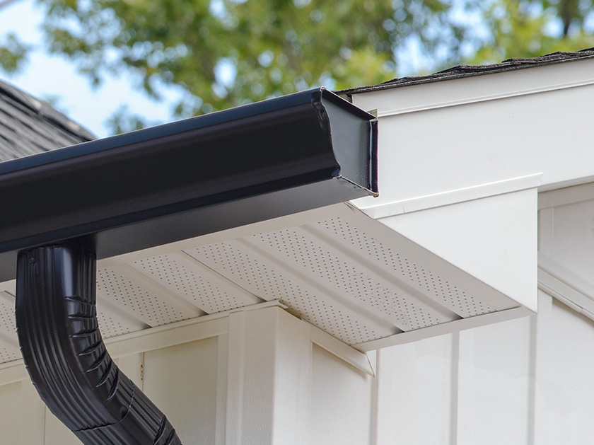 Rain gutter roof with downpipe